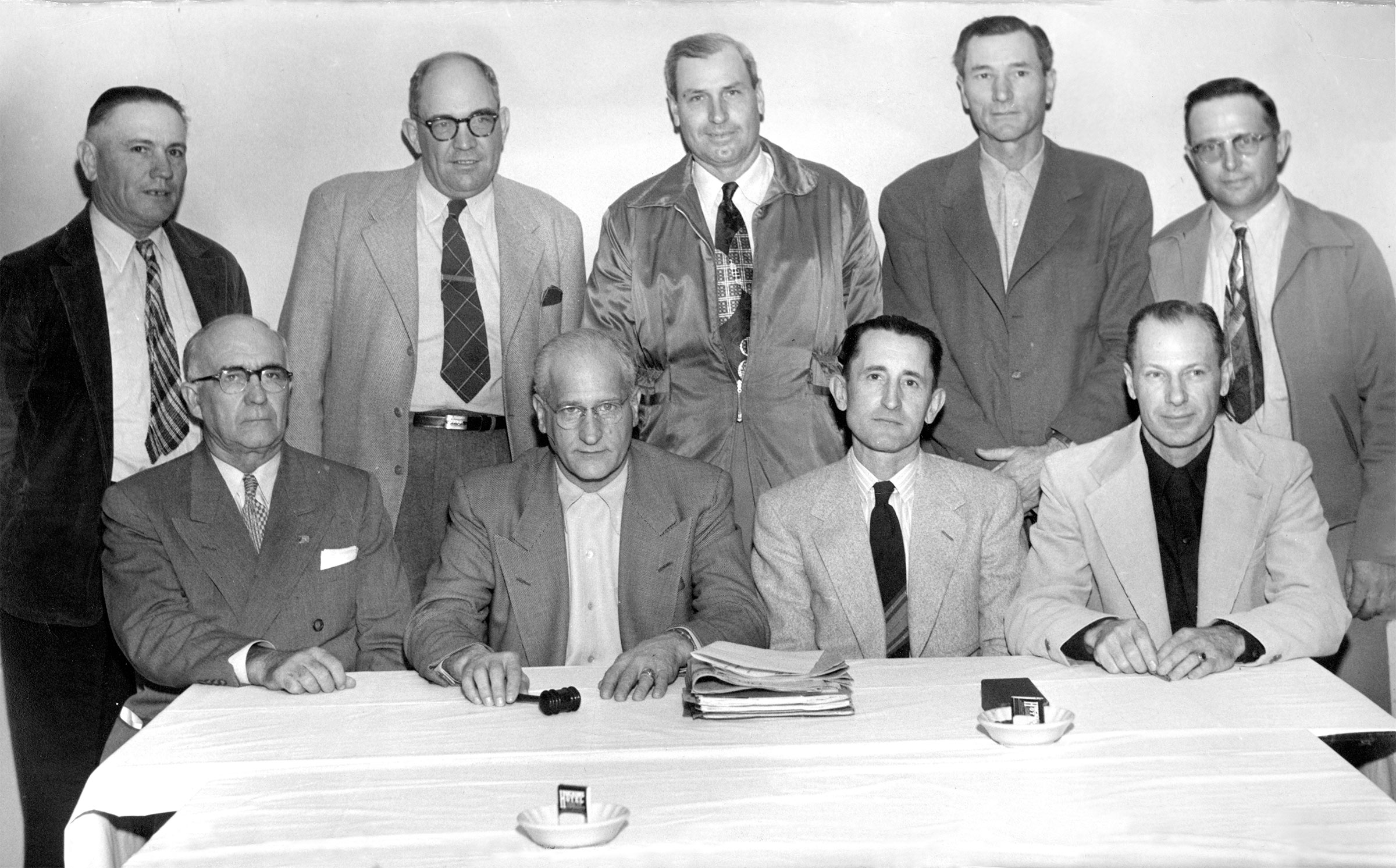 At the 1952 Oklahoma Farm Bureau Convention, two new Farm Bureau districts were created to increase membership, size and potential, bringing the total number of districts to nine. Pictured above is the first nine-member OKFB Board during their January meeting. Seated are (left to right) J.Y. Victor, Secretary; John I. Taylor, President; Lewis H. Munn, Vice President; and Darrell McNutt, Treasurer. Standing are (left to right) Mart Fowler, Harold Davis, F.W. Kannady, C.E. Weller and Glen Johnson.