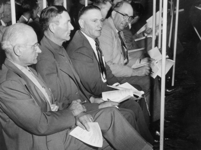 These four Oklahomans carried Oklahoma Farm Bureau’s recommendations to the American Farm Bureau Federation’s 1953 annual meeting in Chicago. Pictured are (left to right) John I. Taylor, Mountain View, former OKFB President; C.E. (Buck) Weller, Yukon; Mart Fowler, Stigler; and Harold Davis, Roff.
