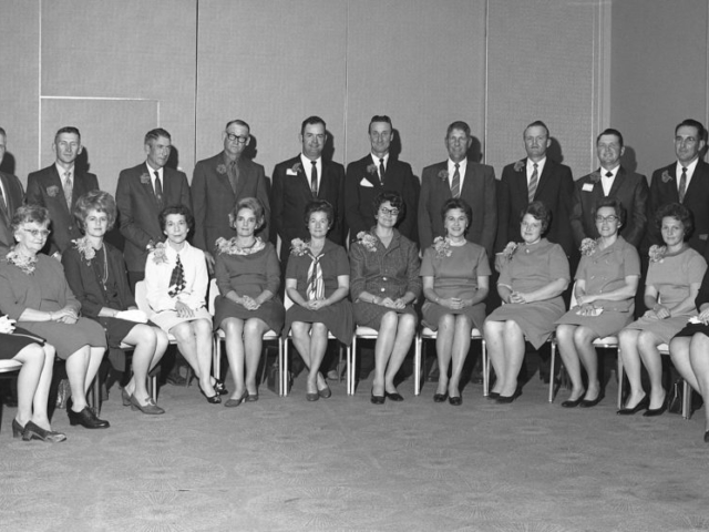 The 12 Farm Families of the Year candidates for 1969 pose for a group photo. Entries from across the state came from the counties of Alfalfa, Atoka, Beaver, Caddo, Cimarron, Cotton, Grady, Kiowa, Logan, Noble, Oklahoma and Tulsa. Sponsored by the Oklahoma Farm Bureau Women, the Farm Family of the Year award was created in 1957 in an effort to recognize outstanding families in Oklahoma who dedicated their life to agriculture.