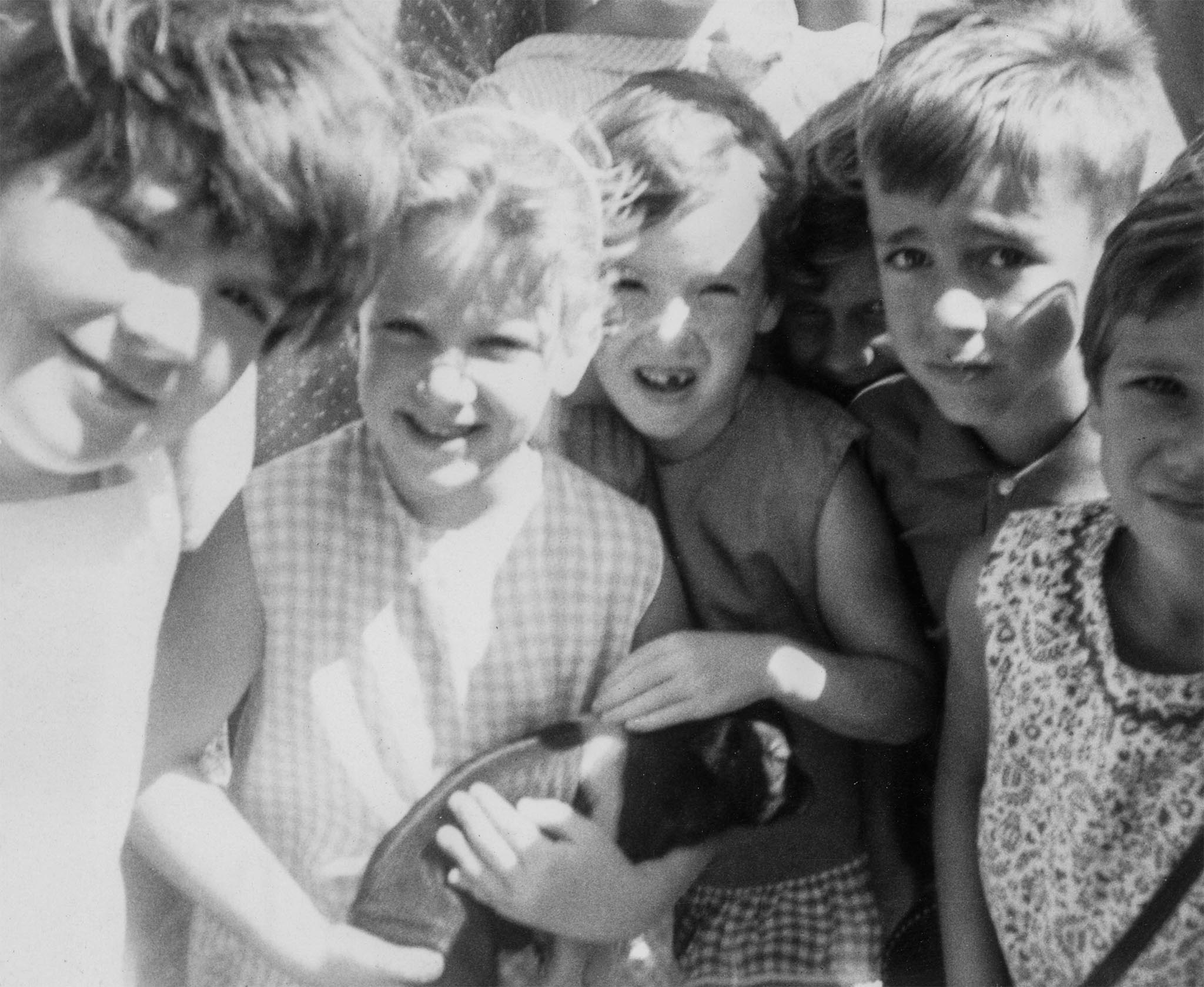 As part of a public relations program of Oklahoma County Farm Bureau, OKFB member Roger Murphy invited groups of children from Midwest City to visit his farm west of Edmond in 1969. Most of the children who came had never been close to a pig before.