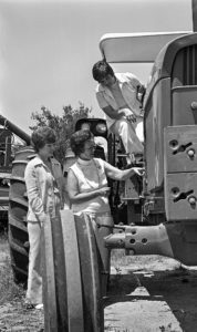 On September 4, 1975, the Noble County’s WLC conducted a Ladies Tractor Driving School at the county fairgrounds. This photo shows Mrs. Ronnie Golliver, Chairman; Mrs. David Sherrard, Vice Chairman; and Mrs. John Main, Secretary, planning subject material for the school.