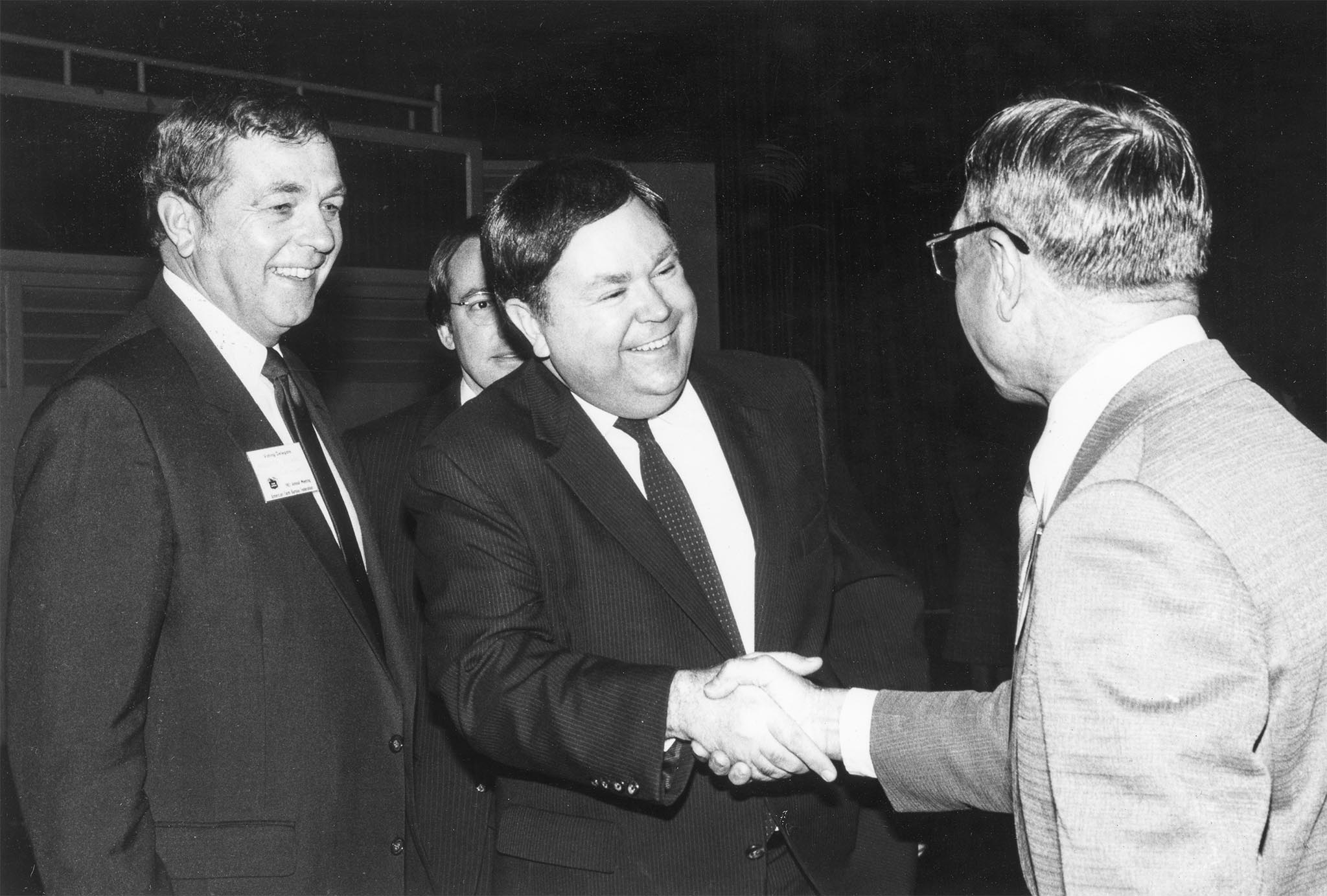 This photo, taken at the 1983 American Farm Bureau Federation annual meeting in Dallas, shows U. S. Sen. David Boren (middle) shaking hands with fellow Oklahoman Emanuel Fuchs of Kiowa County (right), while AFBF President Robert Delano stands by. Boren, an Oklahoma democrat from Seminole, was one of the featured speakers at the conference. About 200 Farm Bureau leaders from Roger Mills, Custer, Washita, Beckham, Kiowa, Greer, Harmon, Jackson and Tillman counties attended the 1982 national meeting.