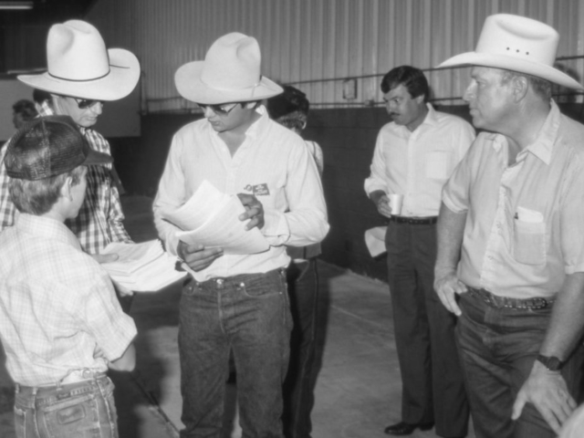 OKFB Young Farmers & Ranchers often sponsor agricultural activities and contests for youth. This photo was taken at the OKFB YF&R-sponsored Livestock Evaluation Field Day in 1986, where Texas County Farm Bureau member Jim Mayer, who also served as state YF&R chairman (center), assisted with the planning and organization of the contest.