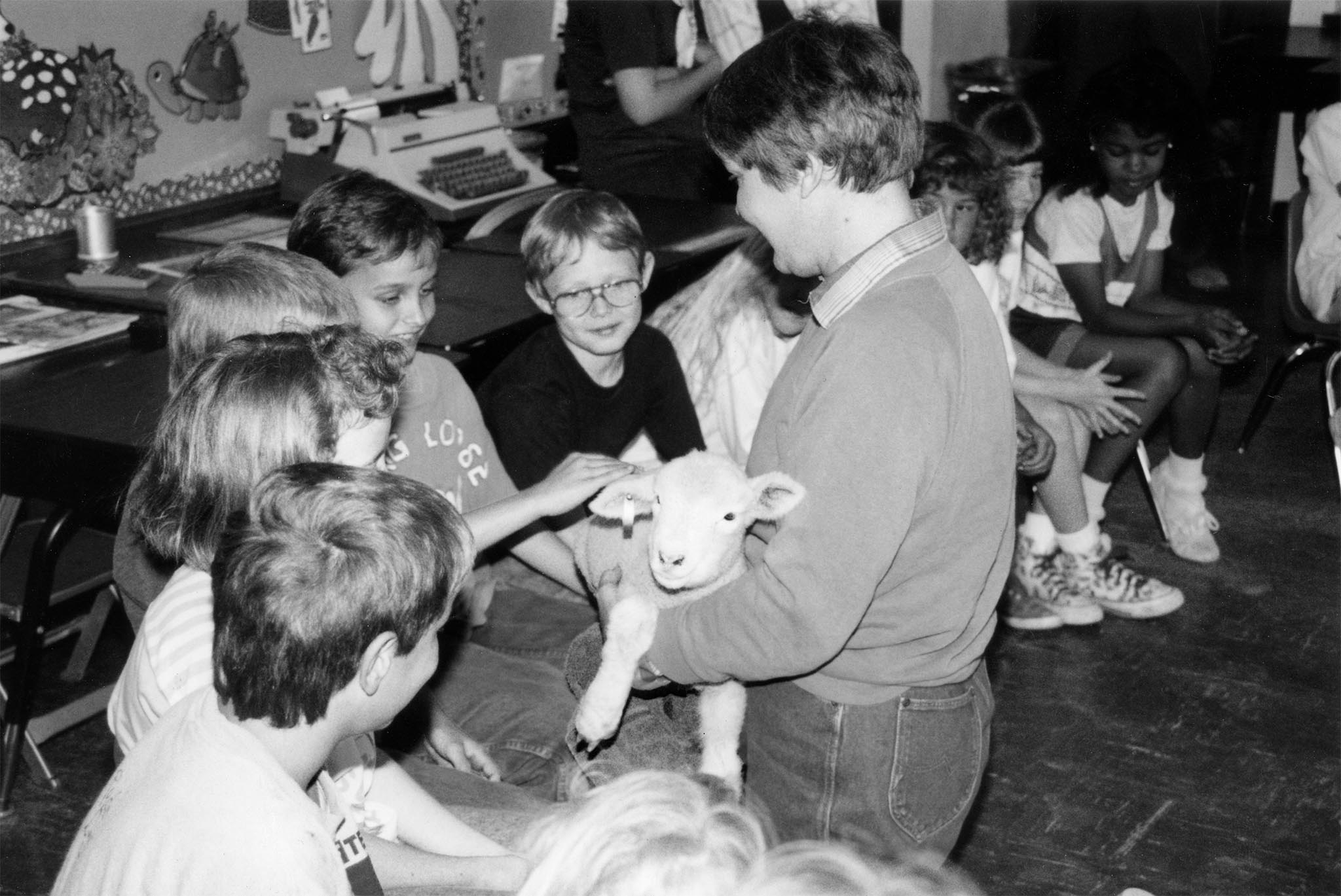 Taken in 1990, this photo shows the heart of the Ag in the Classroom program: introducing agriculture to students who have little or no connection to farming and ranching. Logan County Farm Bureau’s Linda Fruendt made the Ag in the Classroom program come alive for these Guthrie elementary students with a Dorset lamb. Fruendt told the students how farmers care for their livestock and presented a brief summary on raising animals. The highlight of the program for the students seemed to be when each had the opportunity to hold and pet the lamb. The Oklahoma Farm Bureau Women’s Leadership Committee continues to proudly support the Ag in the Classroom program on many levels, helping Oklahoma educators learn more about agriculture and how to incorporate farming and food into their daily classroom activities.