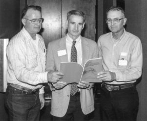 In 1993, boll weevil problems were a popular topic among farmers. In order to provide farmers and legislators with information concerning boll weevil eradication, Stephens County Farm Bureau held a meeting in late March at the Red River Vo-Tech. Pictured here is Oklahoma Sen. Larry Lawler, center, looking over boll weevil eradication facts with Stephens County President Bill Nunley (left) and Oklahoma Farm Bureau Board Member Ralph Dickson. Lawler was the Vice Chairman of the Senate Agriculture Committee.