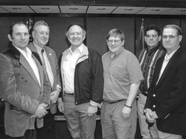 The chairmen of each commodity committee for 1996 gave reports detailing their activities during the American Farm Bureau Federation commodity meeting to the OKFB Board. The six also presented opinions on how to more effectively involve county Farm Bureau members and leaders in the activities of their commodities. Pictured are (left to right) Gary Fisher of Cherokee County, Poultry Advisory Committee Chairman; Merle Atkins of Tillman County, Cotton Advisory Committee Chairman; Jimmy Kinder of Cotton County, Beef Advisory Committee Chairman; Rodd Moesel of Canadian County, Ag Nursery and Greenhouse Advisory Committee Chairman; James Covey of Custer County, Wheat Advisory Committee Chairman; and Doyle Wilson of Hughes County, Peanut Advisory Committee Chairman.