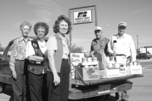Community services is an integral part of county Farm Bureau activities in communities throughout Oklahoma. Here, Comanche County Farm Bureau members display a bounty of collected food items to donate to their local food pantry in 2003, part of an annual drive that continues today. Pictured are (left to right) Comanche County’s Beverly Glasgow, Rhonda Hankins, Georgia Doye, Damon Doye and Don Hankins.