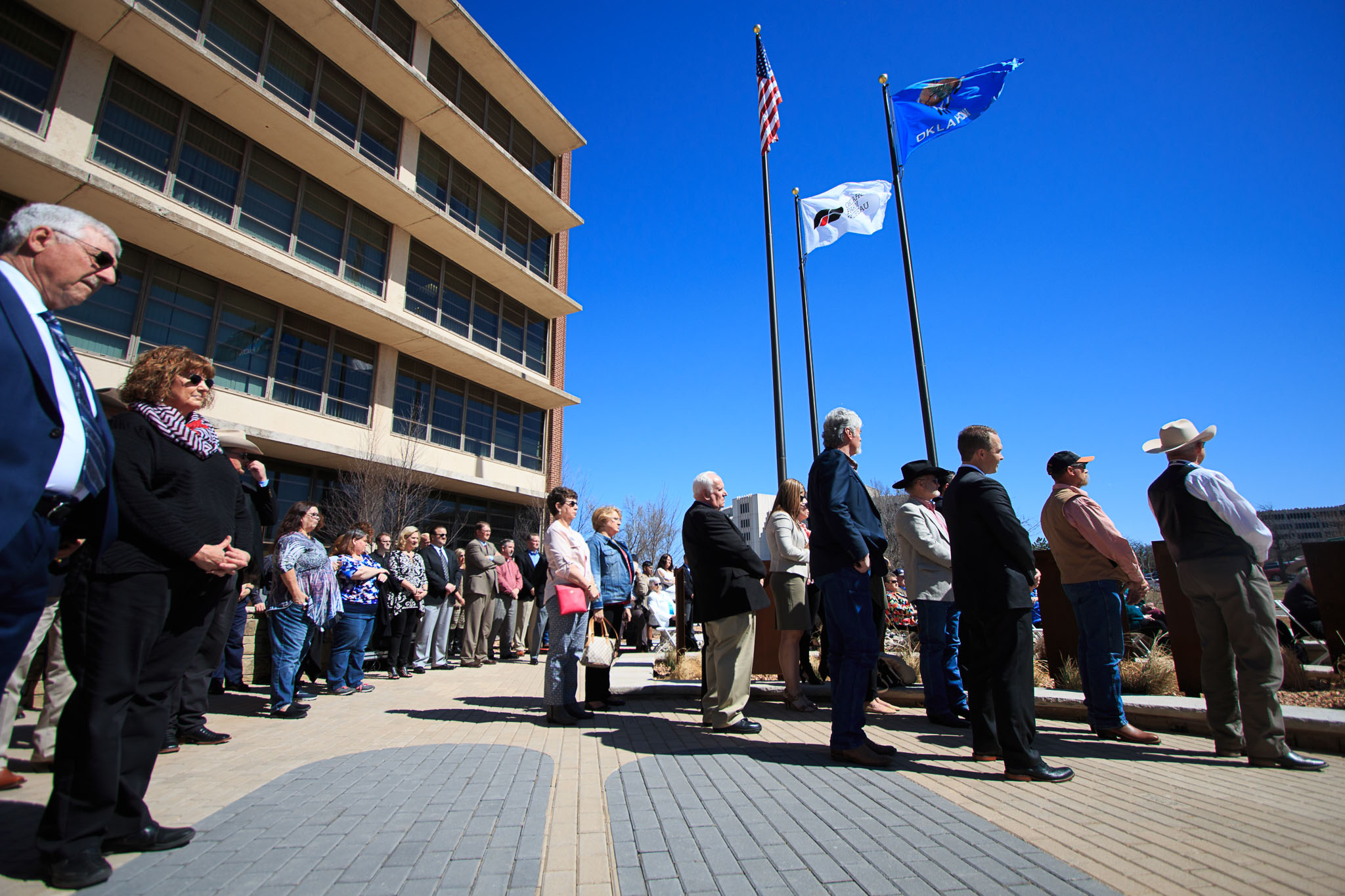 Oklahoma Farm Bureau members and guests listen to remarks during the courtyard dedication on March 7, 2017.